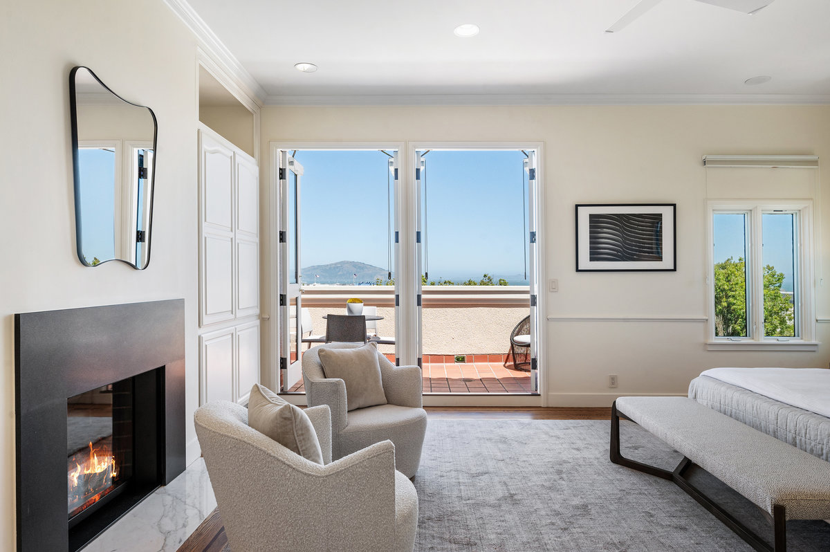 Enjoy the warmth of the fireplace and the very best views in the residence